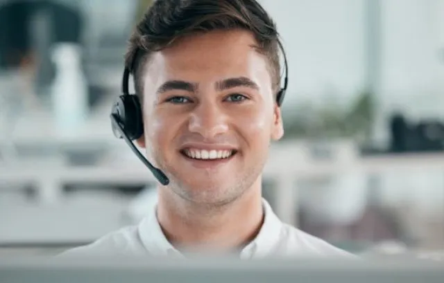 Call centre operative wearing a headset